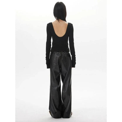 A chic backless long sleeve slim top for women in a solid pattern, perfect for casual and formal occasions.