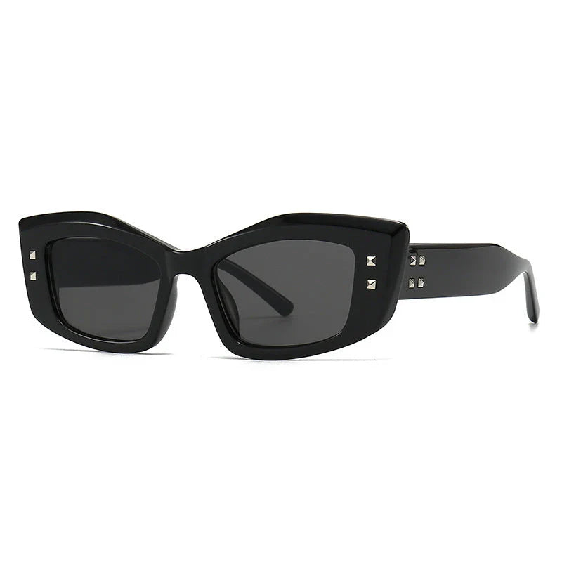 Retro cat eye sunglasses with rivet details in a bold, square frame for a fashionable and unique look