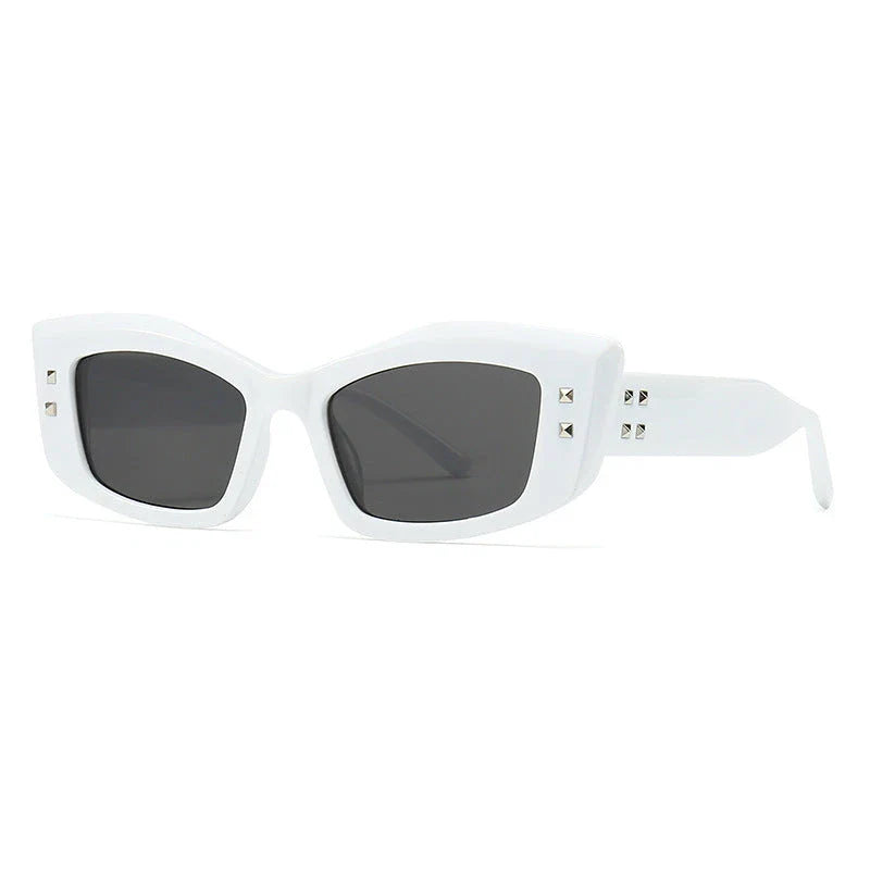 Retro cat eye sunglasses with rivet details in a bold, square frame for a fashionable and unique look
