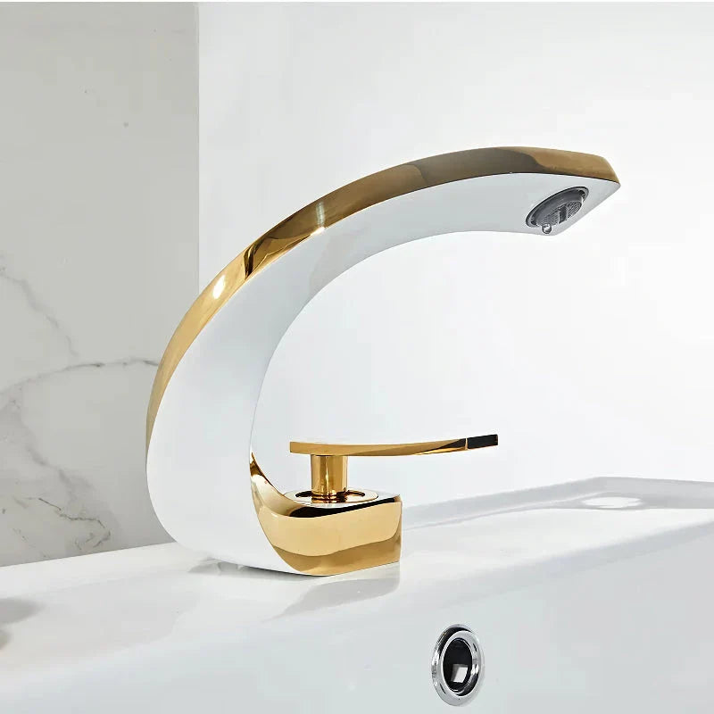 Elegant brass gold and white bathroom faucet with contemporary design and single handle control