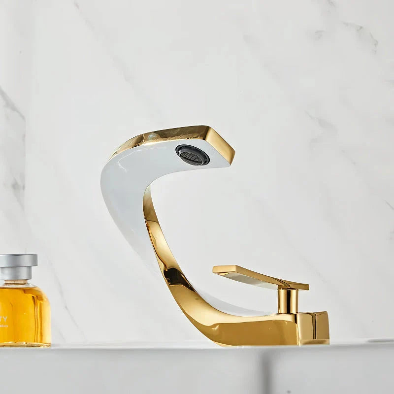 Elegant brass gold and white bathroom faucet with contemporary design and single handle control