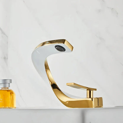 Elegant brass gold and white bathroom faucet with contemporary design and single handle control