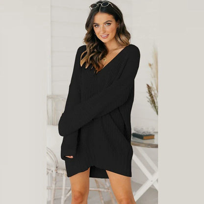 Loose v-neck knitted dress in a relaxed, comfortable silhouette with a v-neckline and long sleeves