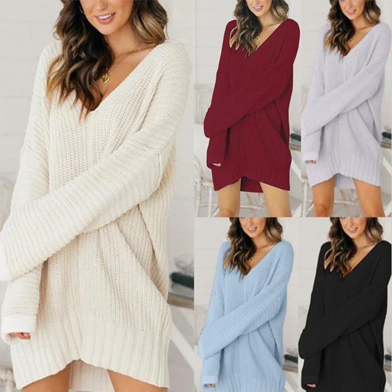 Loose v-neck knitted dress in a relaxed, comfortable silhouette with a v-neckline and long sleeves