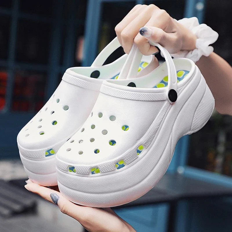 Fashionable leopard and snake print high heels with a sleek, rounded toe and comfortable flat heel