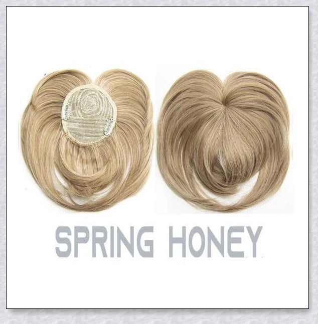 A woman with the Magic Hair Topper Clip, featuring fuller, thicker hair that blends seamlessly with her natural tresses.