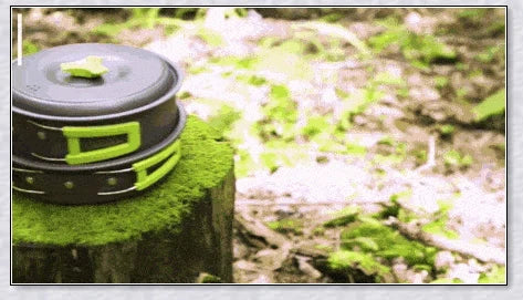 A complete camping cookware set including a teapot, cooking pot, and frying pan for convenient outdoor cooking and meal preparation