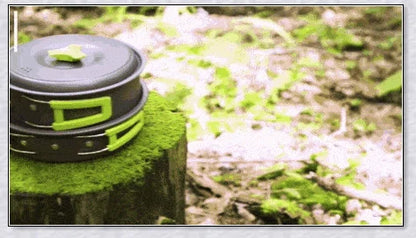 A complete camping cookware set including a teapot, cooking pot, and frying pan for convenient outdoor cooking and meal preparation