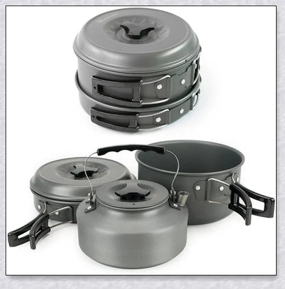 A complete camping cookware set including a teapot, cooking pot, and frying pan for convenient outdoor cooking and meal preparation