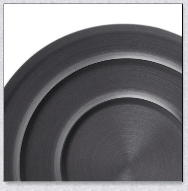 A complete camping cookware set including a teapot, cooking pot, and frying pan for convenient outdoor cooking and meal preparation