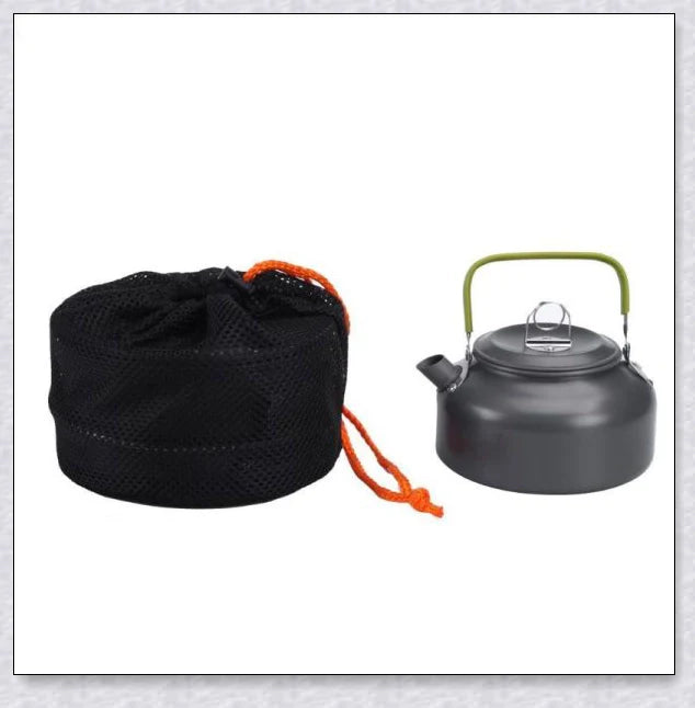 A complete camping cookware set including a teapot, cooking pot, and frying pan for convenient outdoor cooking and meal preparation
