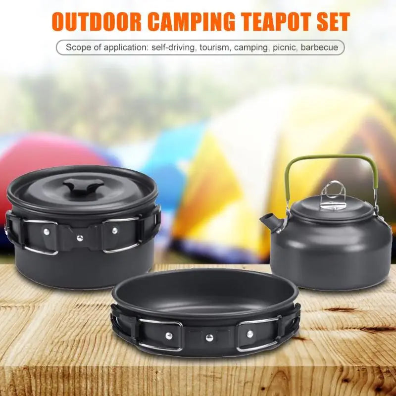 A complete camping cookware set including a teapot, cooking pot, and frying pan for convenient outdoor cooking and meal preparation