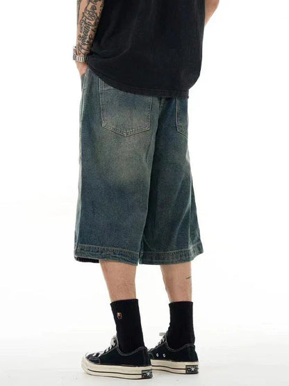 Men's casual denim shorts with a relaxed, wide-leg design and washed finish