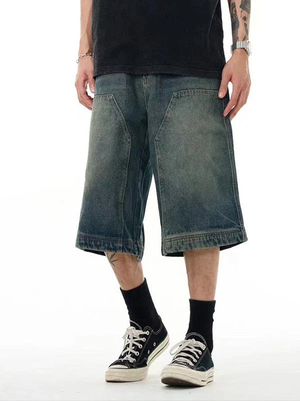 Men's casual denim shorts with a relaxed, wide-leg design and washed finish