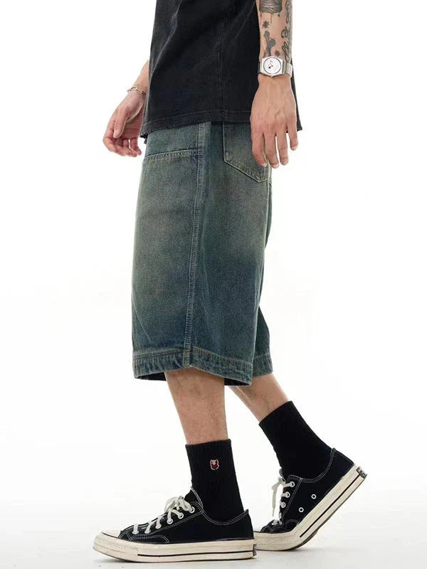 Men's casual denim shorts with a relaxed, wide-leg design and washed finish