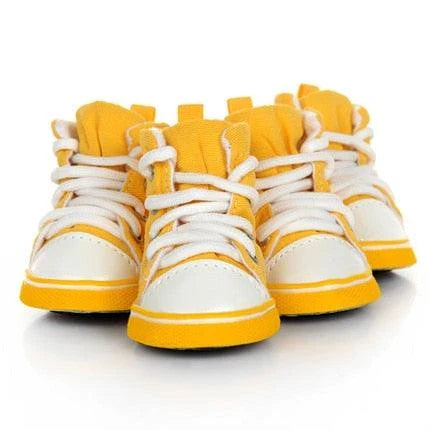 Colorful pet shoes in various sizes and vibrant candy-inspired colors, designed to provide comfort and style for your furry companion.