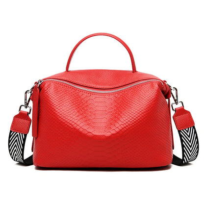 A stylish and durable messenger bag made from first-layer cowhide leather, with an adjustable shoulder strap and multiple interior pockets for organization.