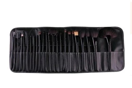 24 luxurious makeup brushes with wood-toned or black handles, presented in a stylish carrying case for on-the-go beauty touch-ups