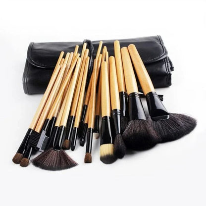 24 luxurious makeup brushes with wood-toned or black handles, presented in a stylish carrying case for on-the-go beauty touch-ups