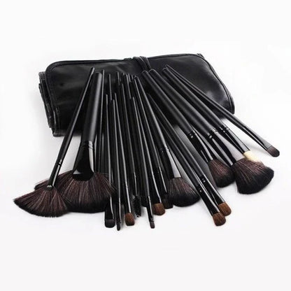 24 luxurious makeup brushes with wood-toned or black handles, presented in a stylish carrying case for on-the-go beauty touch-ups