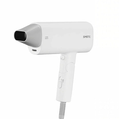 Compact, portable hair dryer with foldable handle and multiple styling settings for on-the-go hair care.