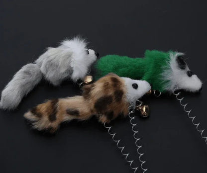 A set of plush and plastic mouse-shaped toys for cats to play with, encouraging their natural hunting instincts.
