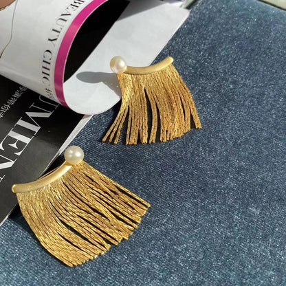 Metal tassel chain earrings with freshwater pearls, a versatile accessory for any outfit