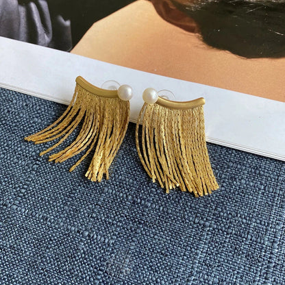 Metal tassel chain earrings with freshwater pearls, a versatile accessory for any outfit