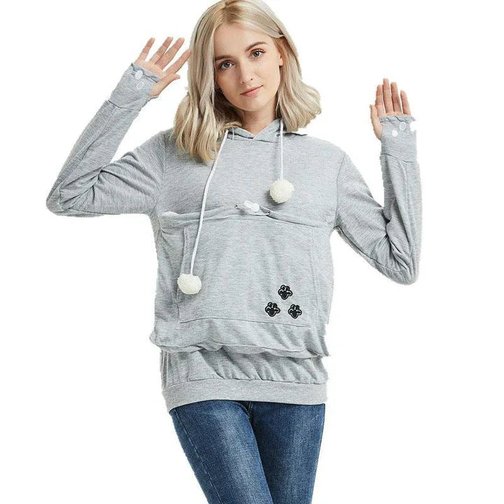 Cozy and stylish women's hoodies with a pet pocket for carrying your cat or keeping your hands warm during the winter.
