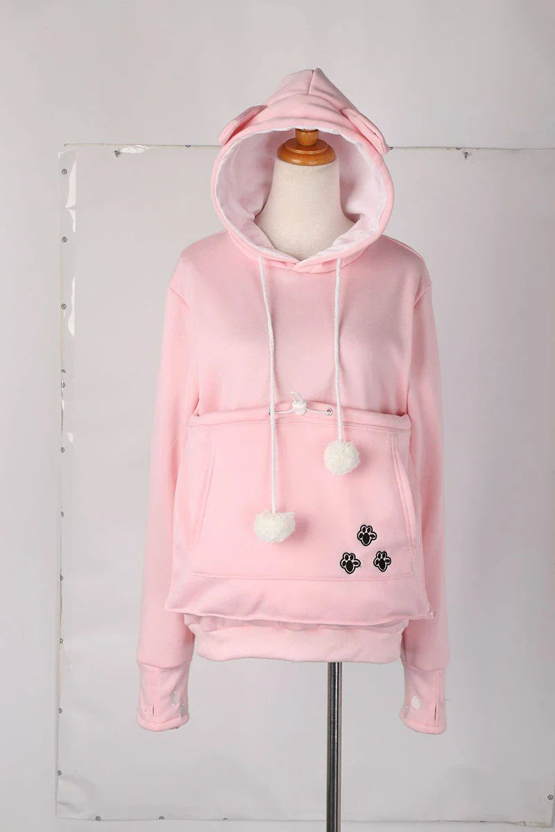 Cozy and stylish women's hoodies with a pet pocket for carrying your cat or keeping your hands warm during the winter.