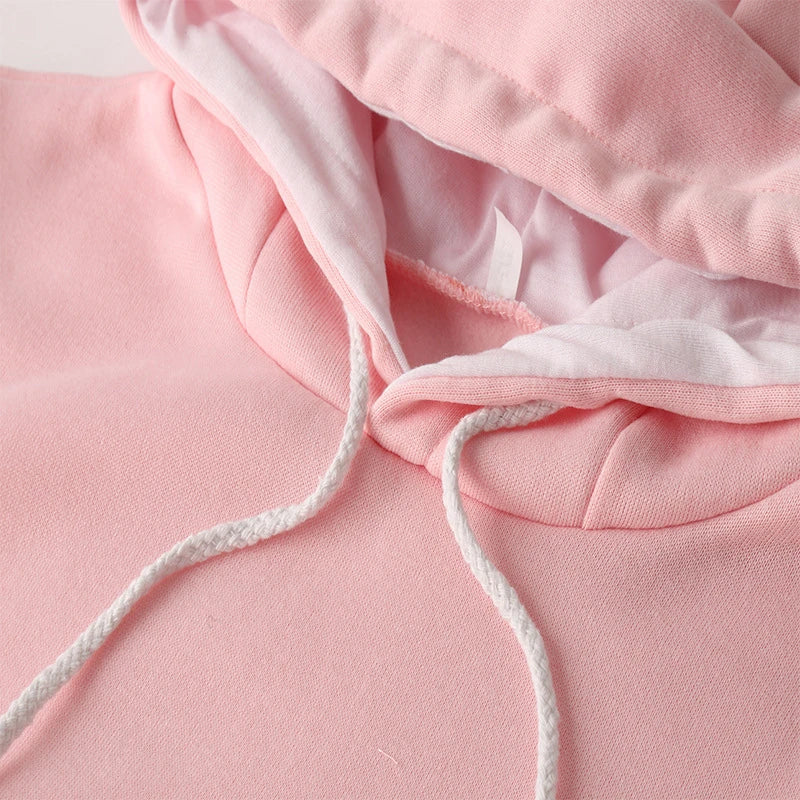 Cozy and stylish women's hoodies with a pet pocket for carrying your cat or keeping your hands warm during the winter.