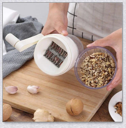 Manual Hand Nut Chopper - Peanut Grinder for Kitchen, a compact and efficient tool for quickly chopping various nuts