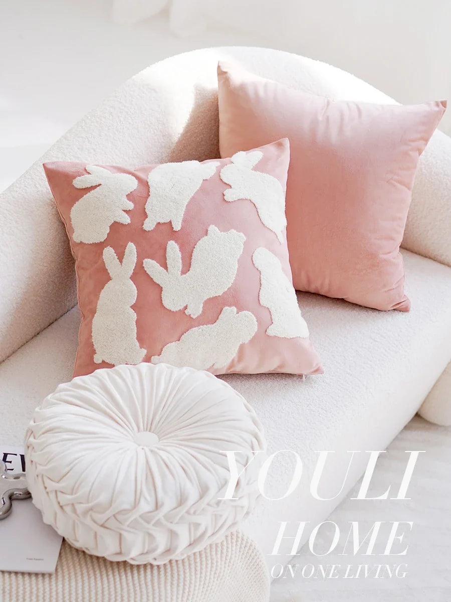A cream-colored, plush cushion with a cute girl design, perfect for use as a headboard, pillow, or accent piece in a modern, stylish bedroom or living room.