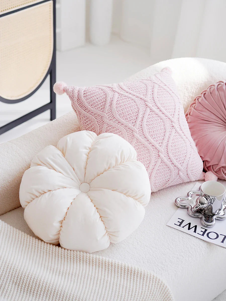 A cream-colored, plush cushion with a cute girl design, perfect for use as a headboard, pillow, or accent piece in a modern, stylish bedroom or living room.