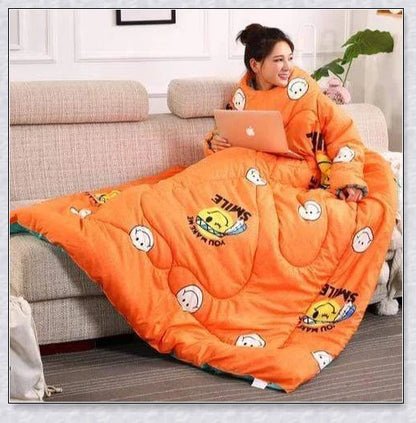 A cozy, wearable lazy quilt with sleeves in gray, providing hands-free warmth and comfort for relaxation and outdoor activities.