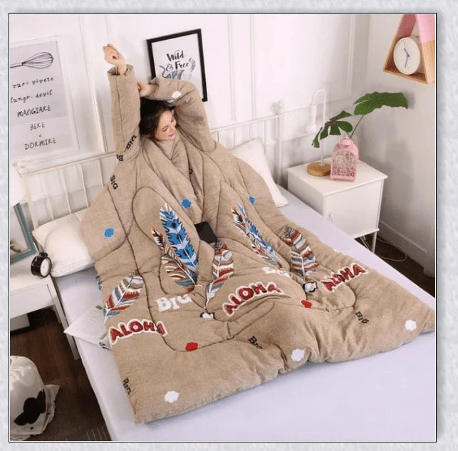 A cozy, wearable lazy quilt with sleeves in gray, providing hands-free warmth and comfort for relaxation and outdoor activities.