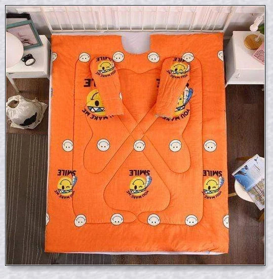 A cozy, wearable lazy quilt with sleeves in gray, providing hands-free warmth and comfort for relaxation and outdoor activities.