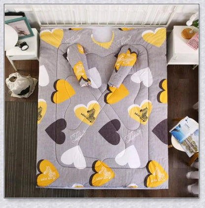 A cozy, wearable lazy quilt with sleeves in gray, providing hands-free warmth and comfort for relaxation and outdoor activities.