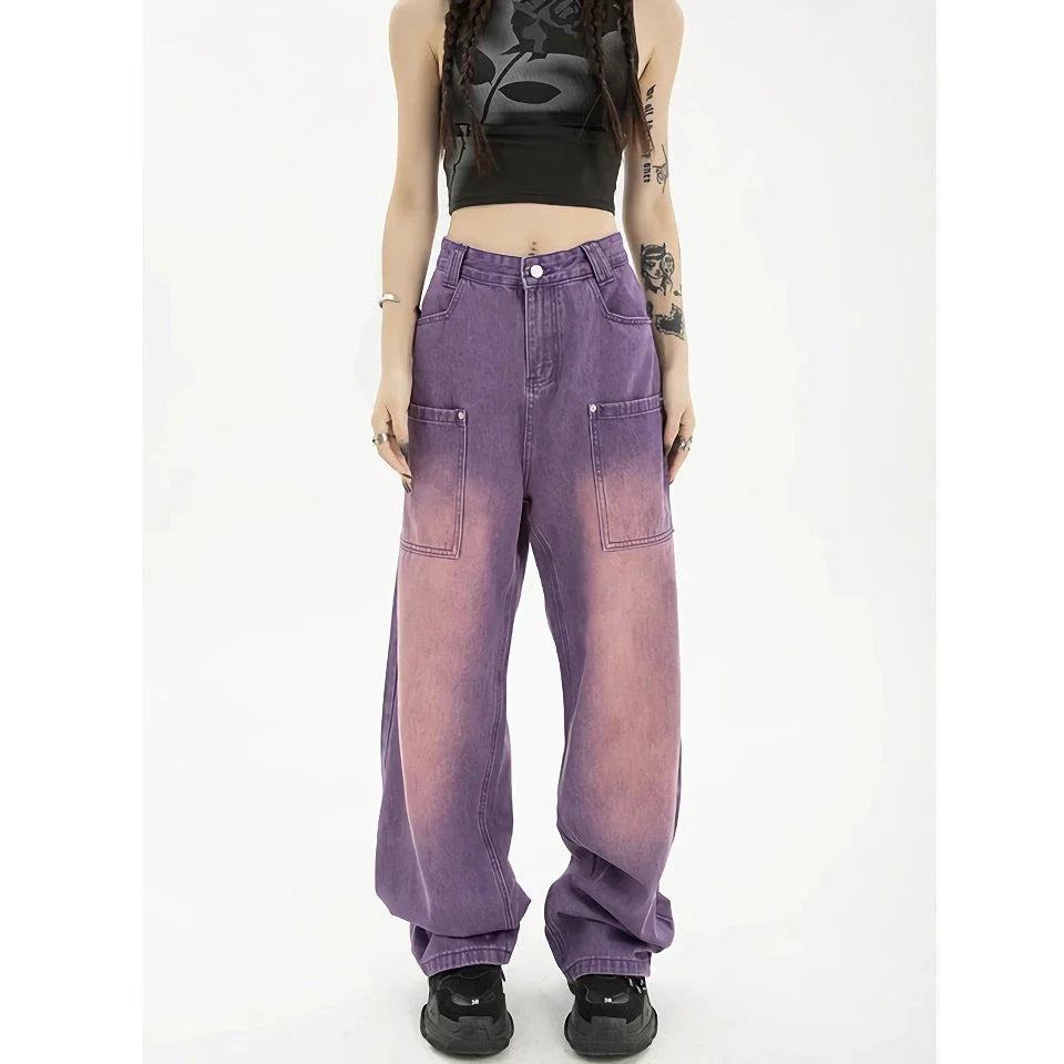 A pair of high-waisted, purple wide-leg jeans with a chic and contemporary silhouette, perfect for any fashionable occasion.