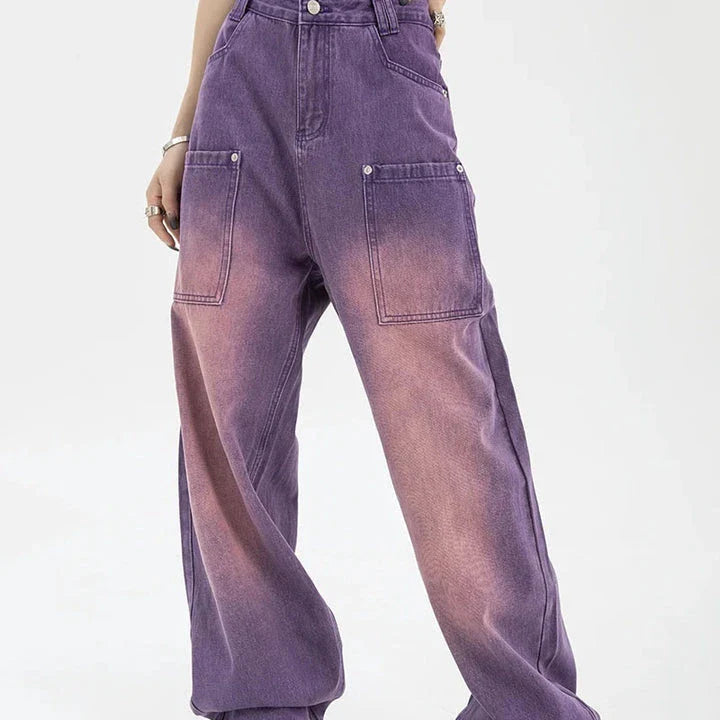 A pair of high-waisted, purple wide-leg jeans with a chic and contemporary silhouette, perfect for any fashionable occasion.