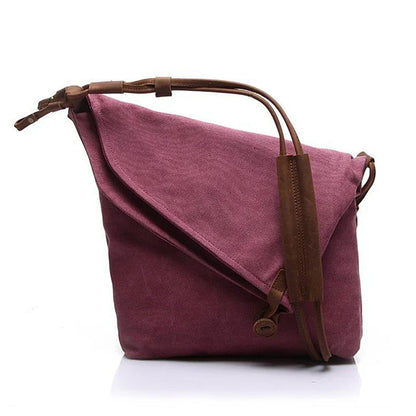 Crazy Horse Leather Shoulder Bag in various color options, showcasing its unique dumpling-style shape and multiple interior pockets for organization.