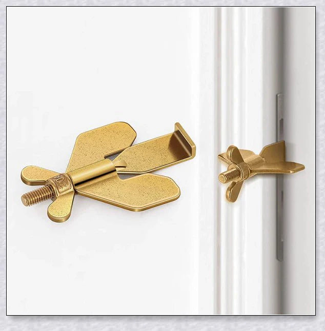 Portable Hotel Door Lock in black and gold colors, a compact and secure travel security device for hotels, dorms, and apartments.