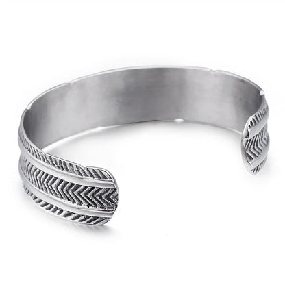 A stainless steel bracelet with a classic, geometric design in a silver finish