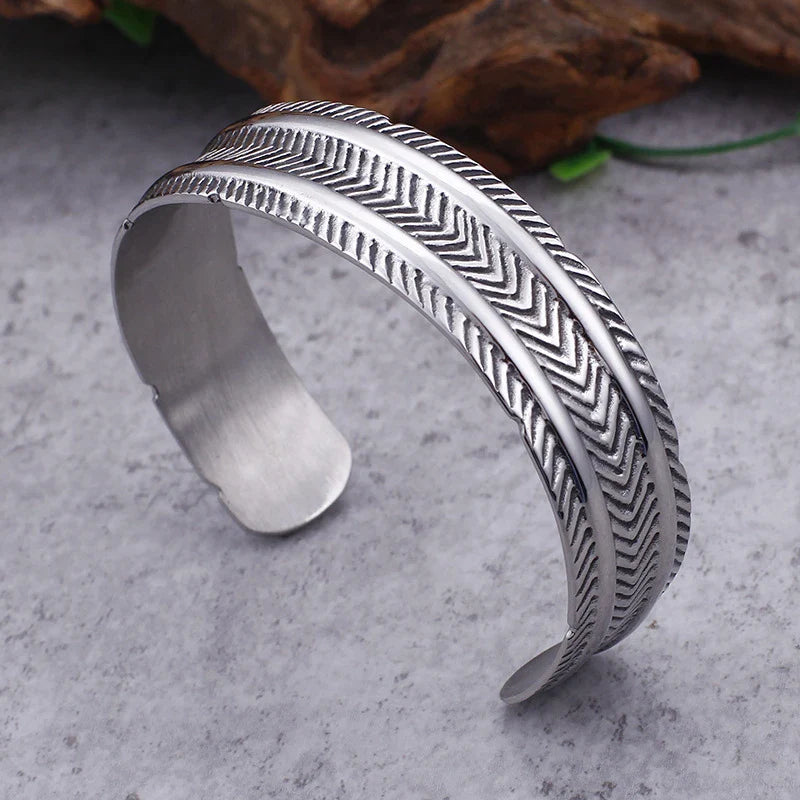 A stainless steel bracelet with a classic, geometric design in a silver finish
