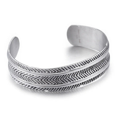 A stainless steel bracelet with a classic, geometric design in a silver finish