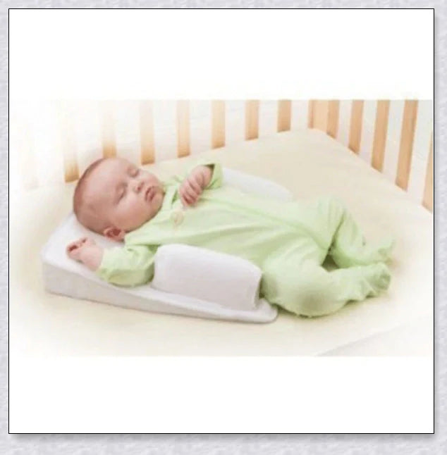 Newborn Baby Sleep Fixed Position & Anti Roll Pillow with breathable mesh and air vent bumpers for comfortable and safe sleep
