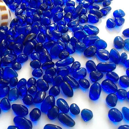 Premium blue gravel for aquarium decoration, featuring vibrant shades and a smooth texture to create a serene and calming underwater environment.