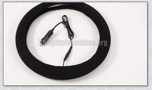 Plush, heated steering wheel cover providing warmth and comfort for cold weather driving