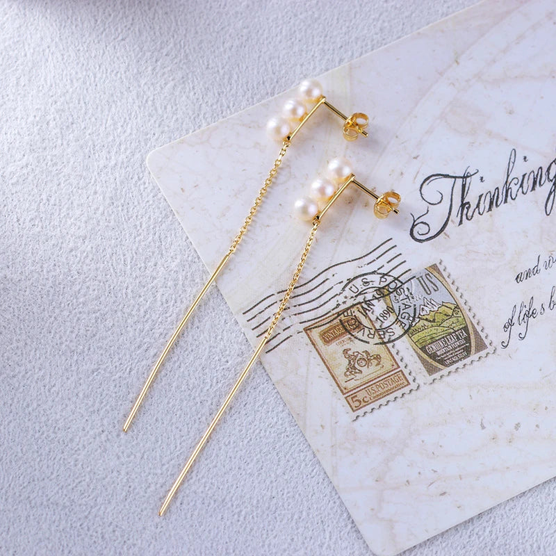 Elegant silver earrings featuring natural pearls for a sophisticated, timeless look