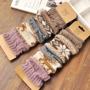 A pair of premium American-made socks in a variety of colors, featuring a soft, breathable fabric blend and reinforced construction for all-day comfort and support.